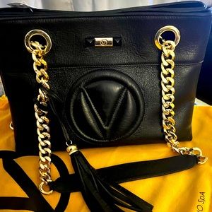 Brand new beautiful Valentino shoulder bag in black and gold straps